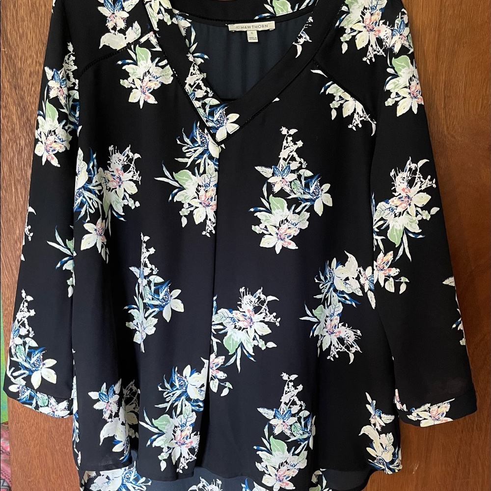 One 3/4 length sleeve blouse